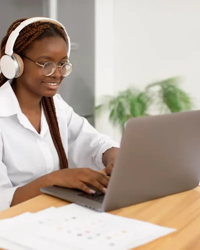 young-woman-working-with-her-headphones